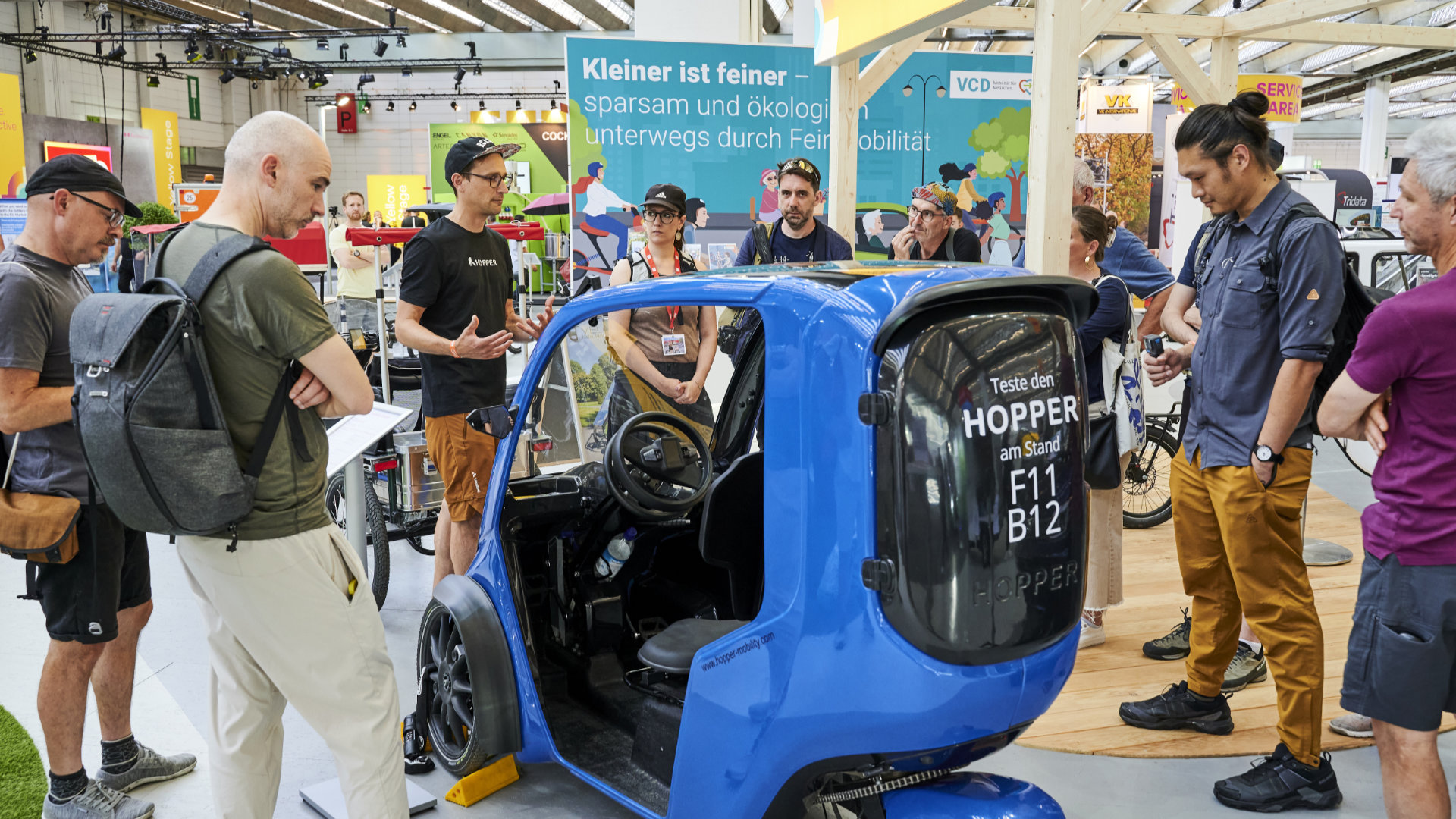 Visitors and exhibitors with Hopper at EUROBIKE